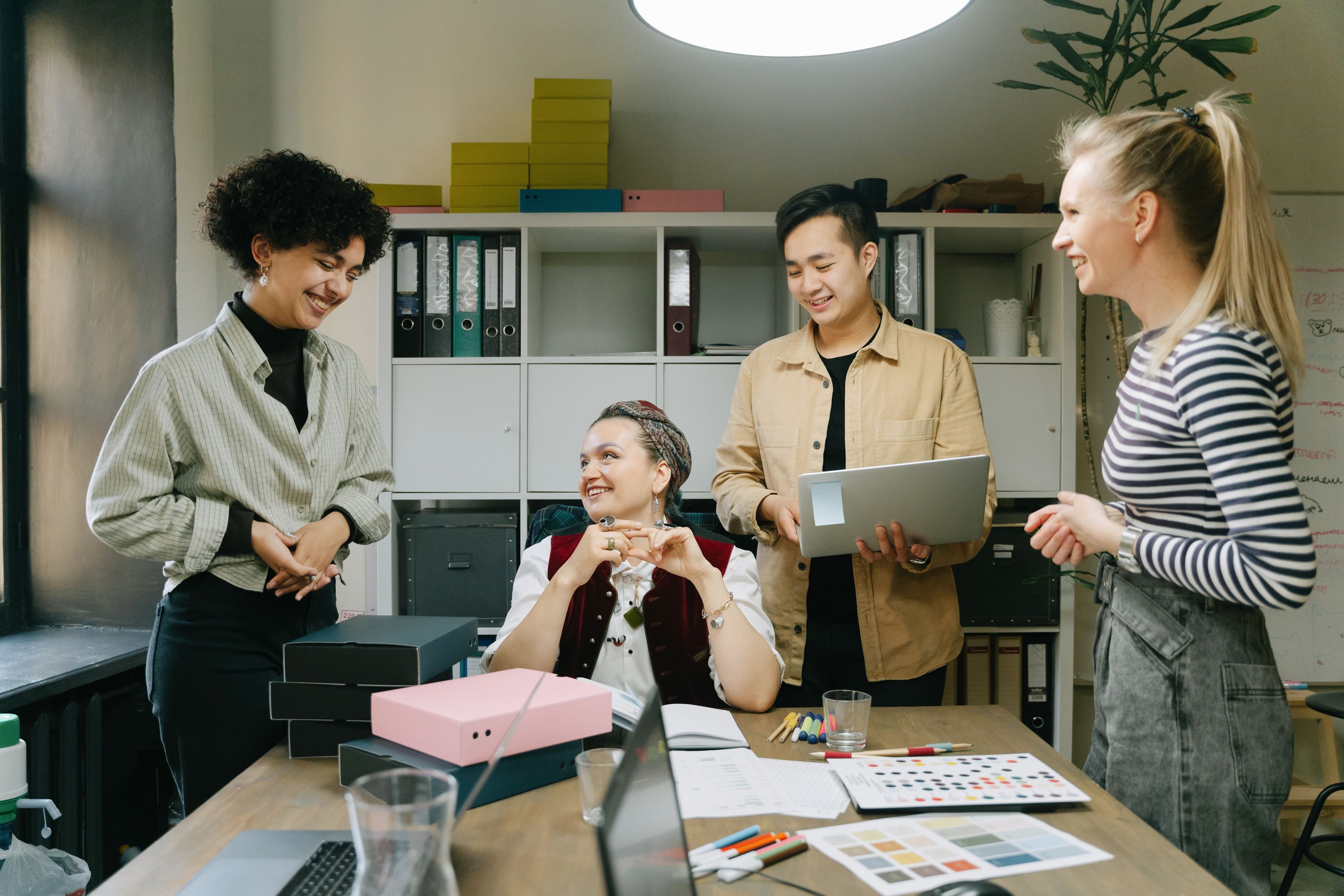 A hiring team reviewing candidates together
